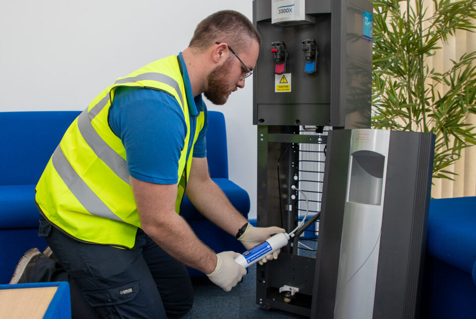 Engineer working on an AA3300X water cooler